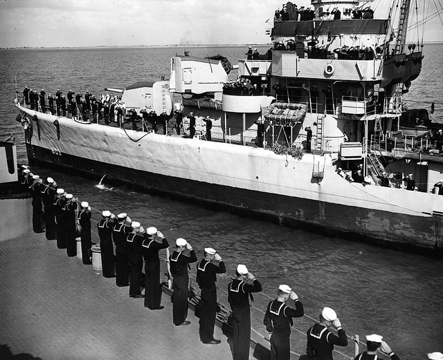 The entourage of King Ibn Saud of Saudi Arabia on the deck of a U.S warship 